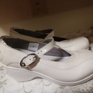 Wedge style , white Crocs, size 8